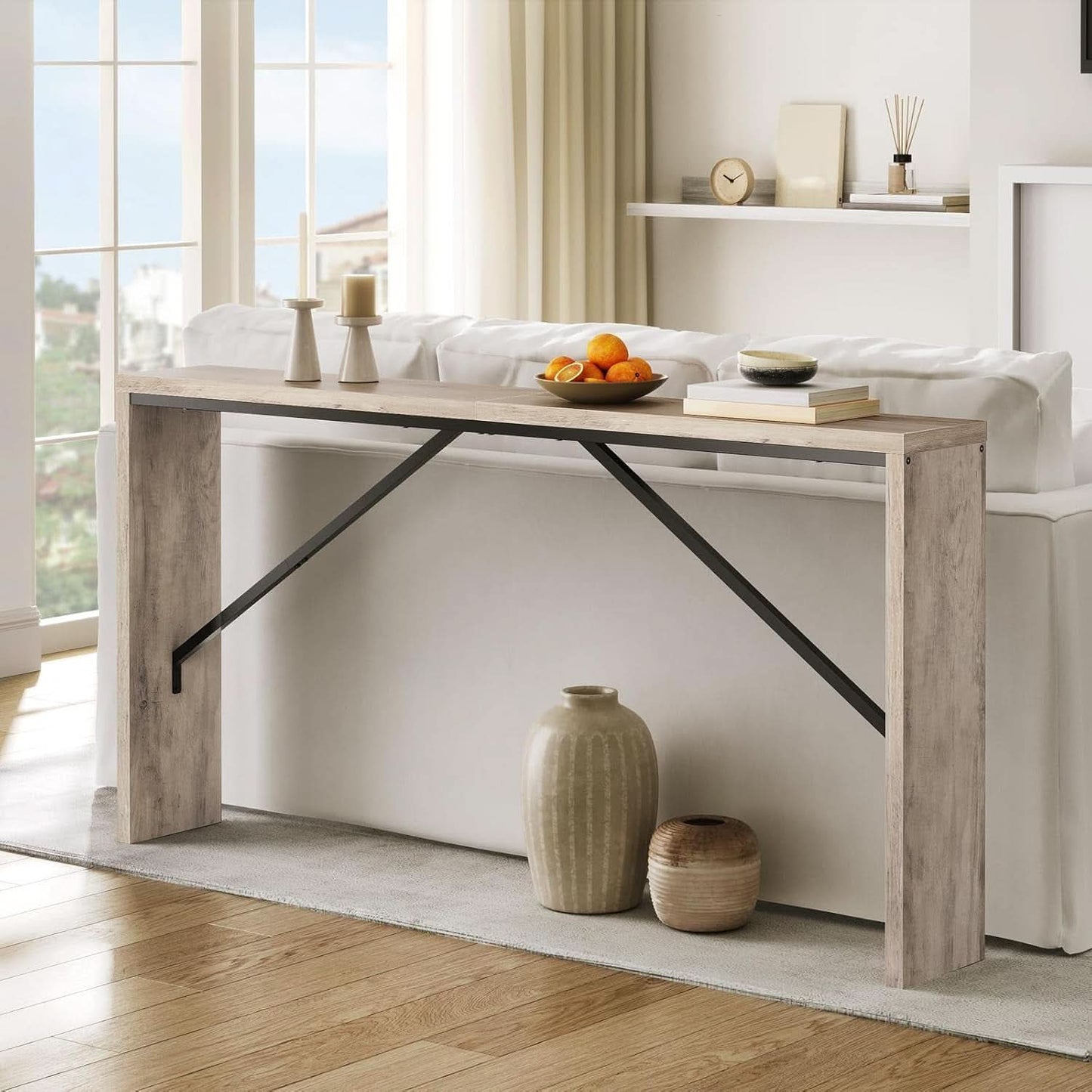 Modern console table with decorative items in a living room setting