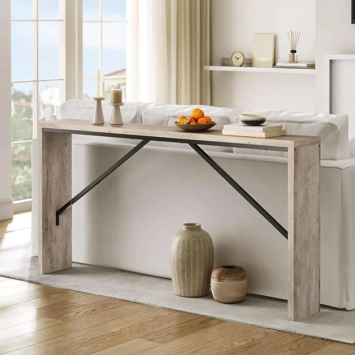 Modern console table with decorative items in a living room setting