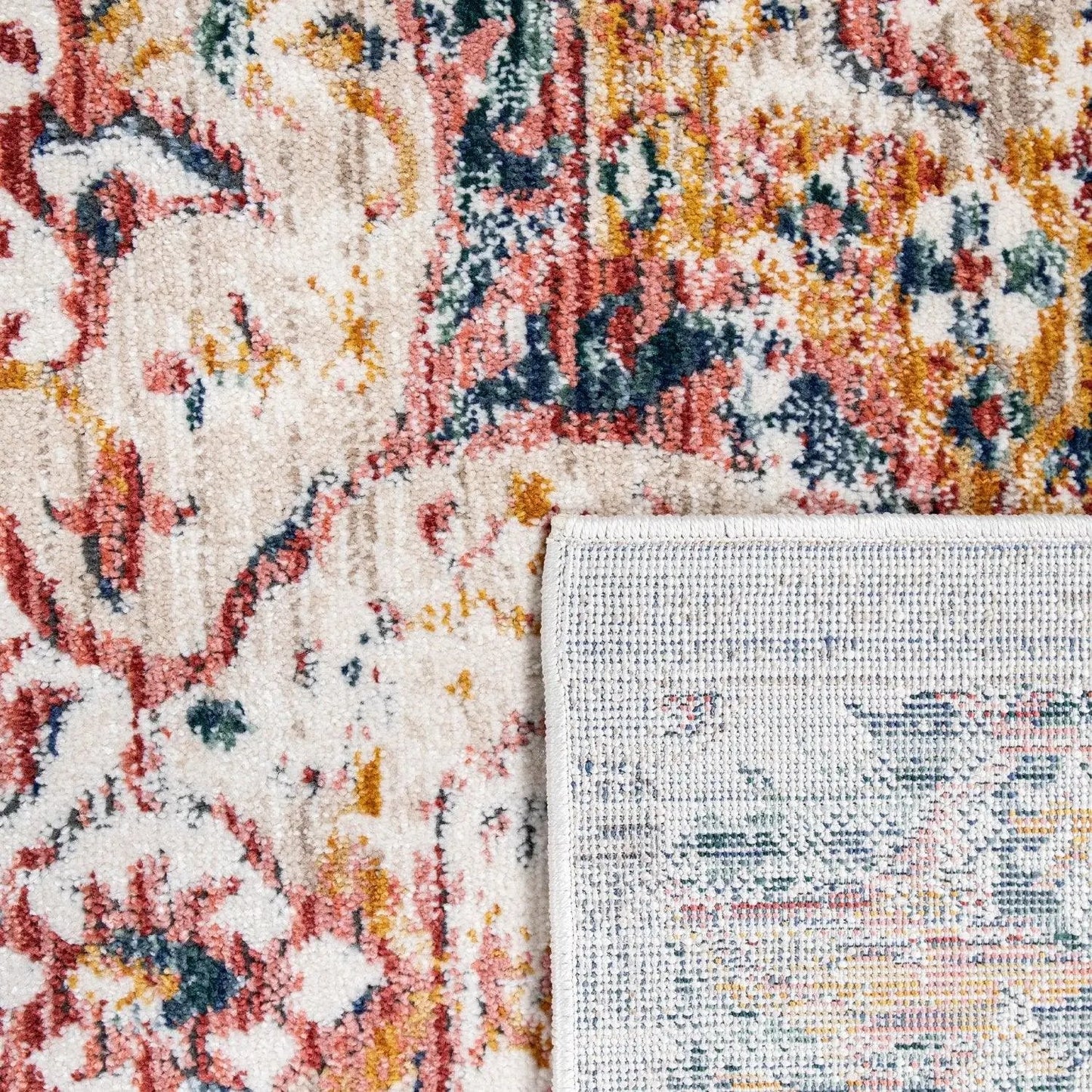 Close-up of a patterned rug with a multicolor design.