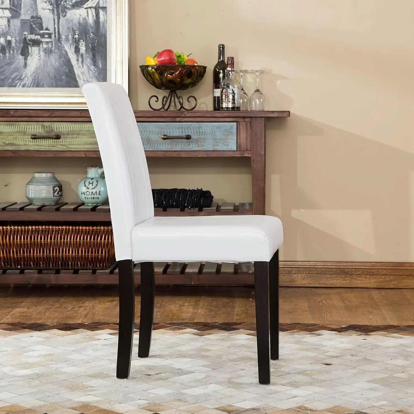 White chair in a room with wooden furniture and decor