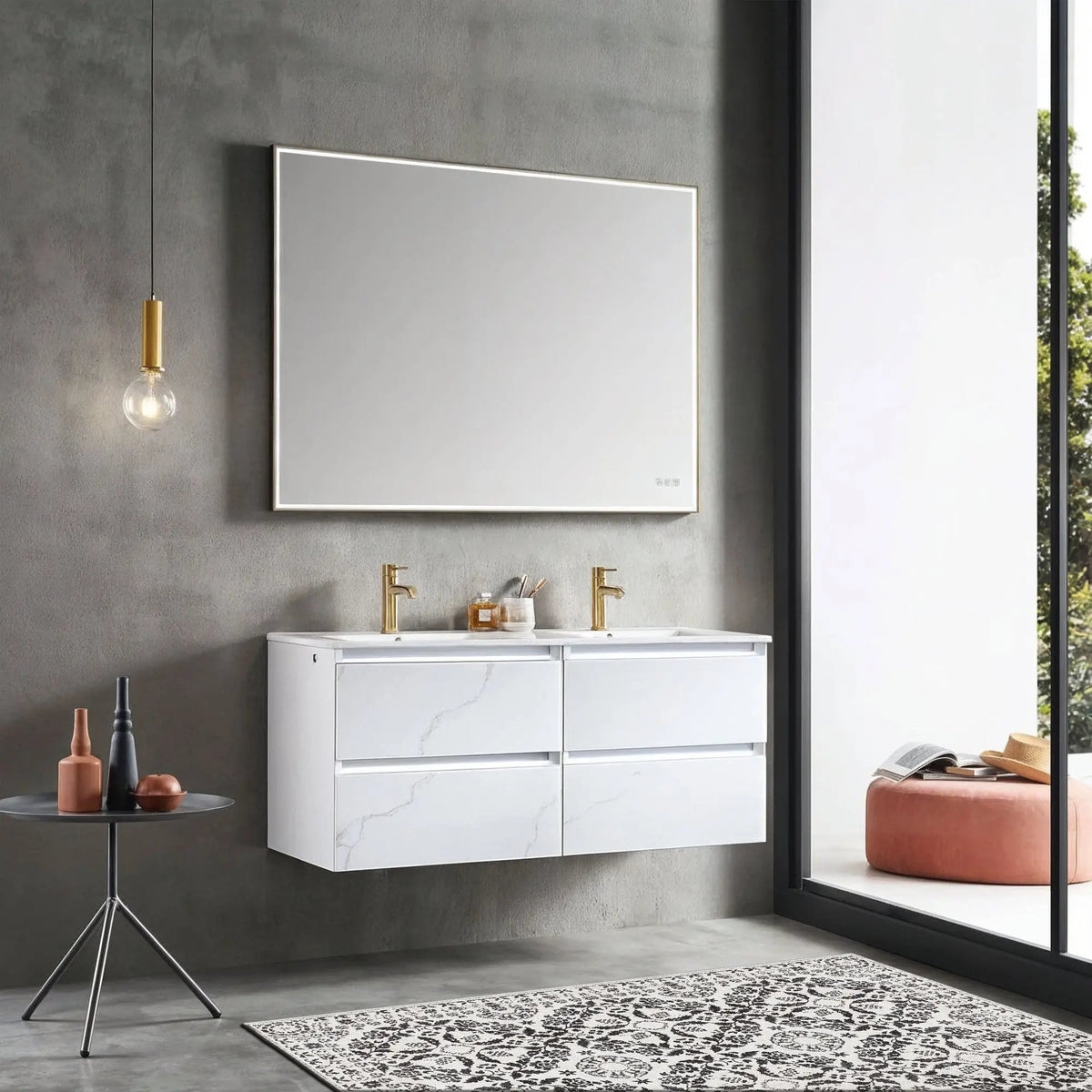 Modern bathroom with white vanity, mirror, and decorative items.
