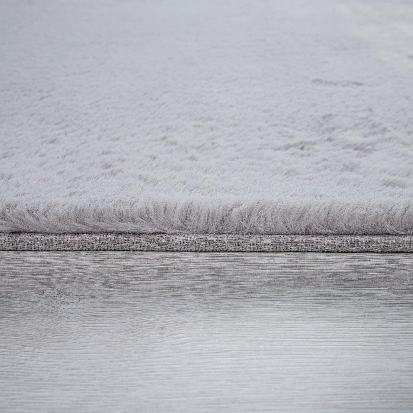 Close-up of a textured gray fabric surface