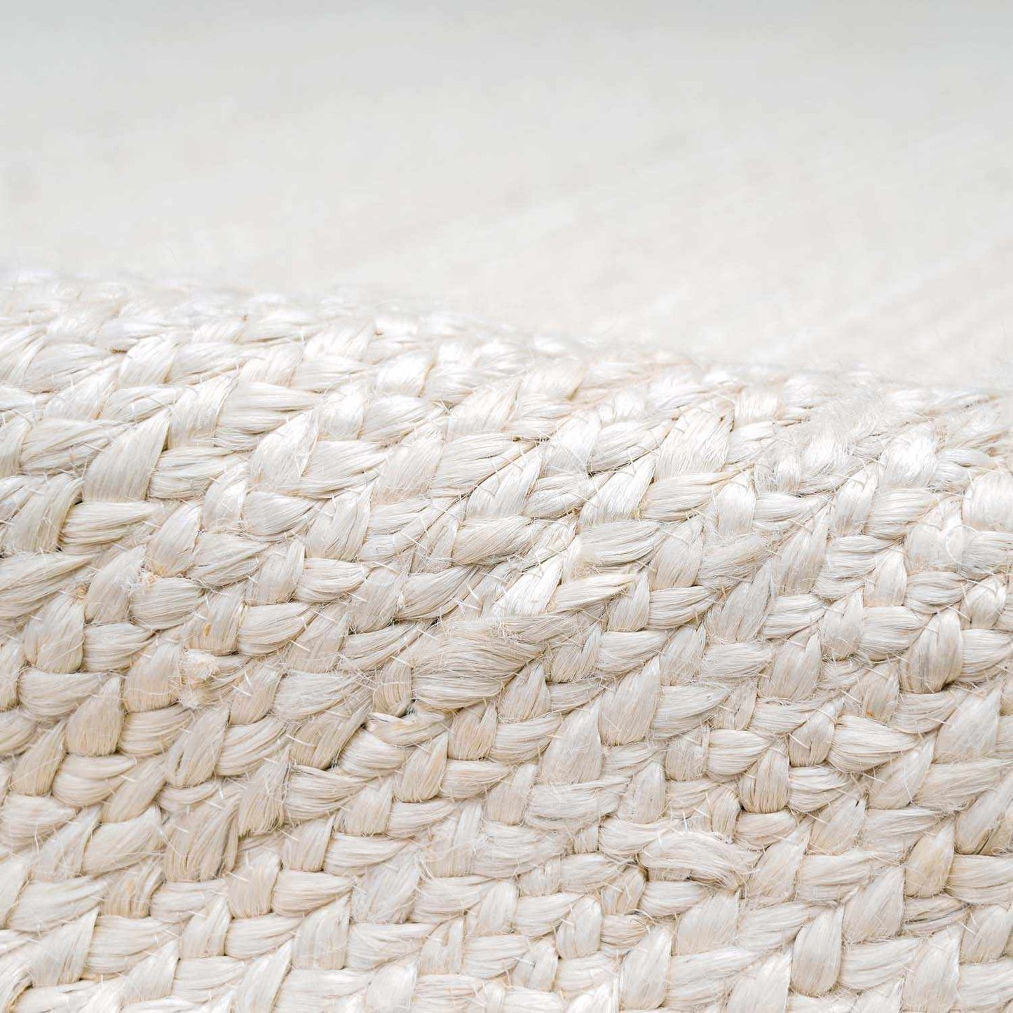 Close-up of a textured white woven surface
