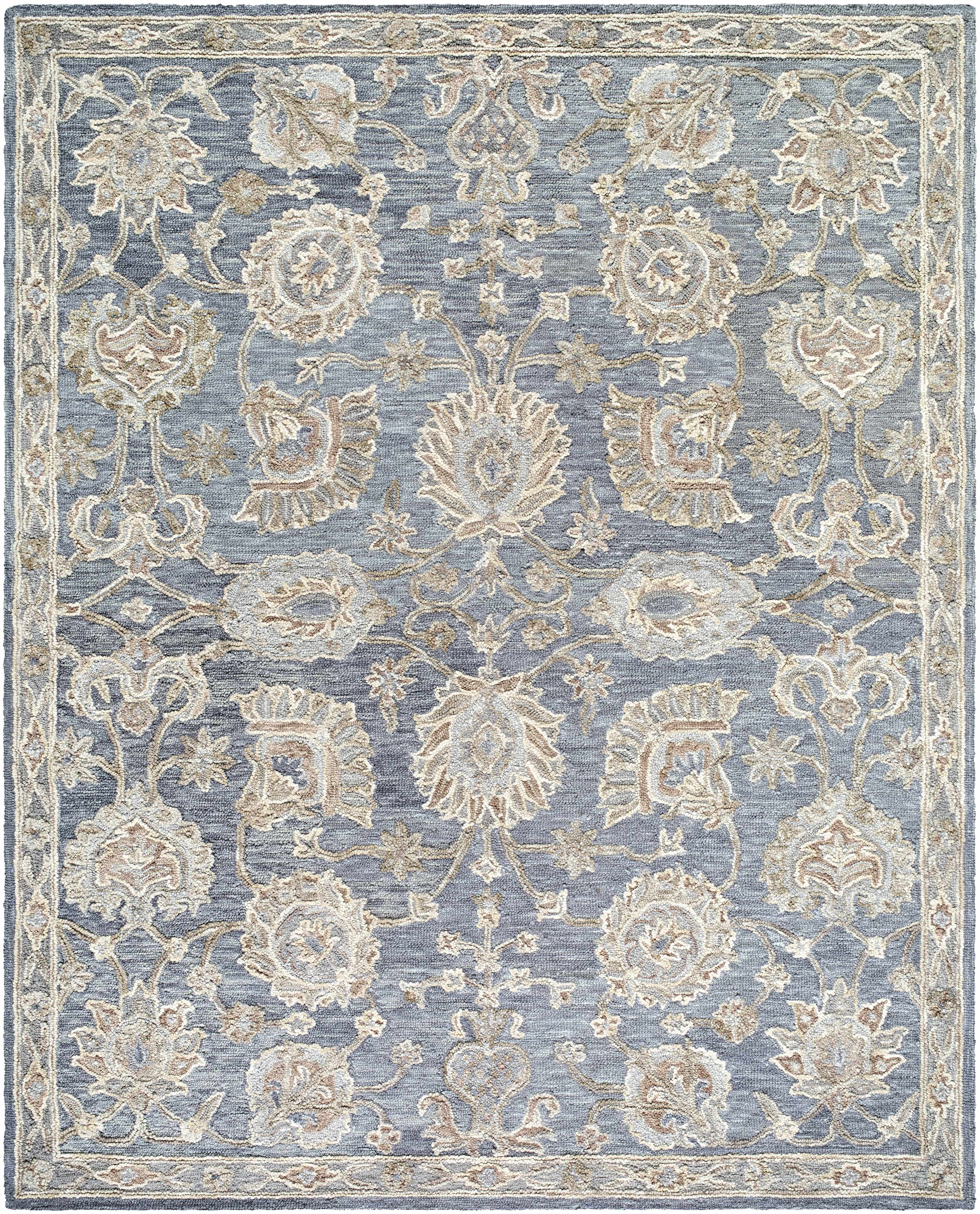 Decorative rug with floral patterns in blue and beige on a blue background