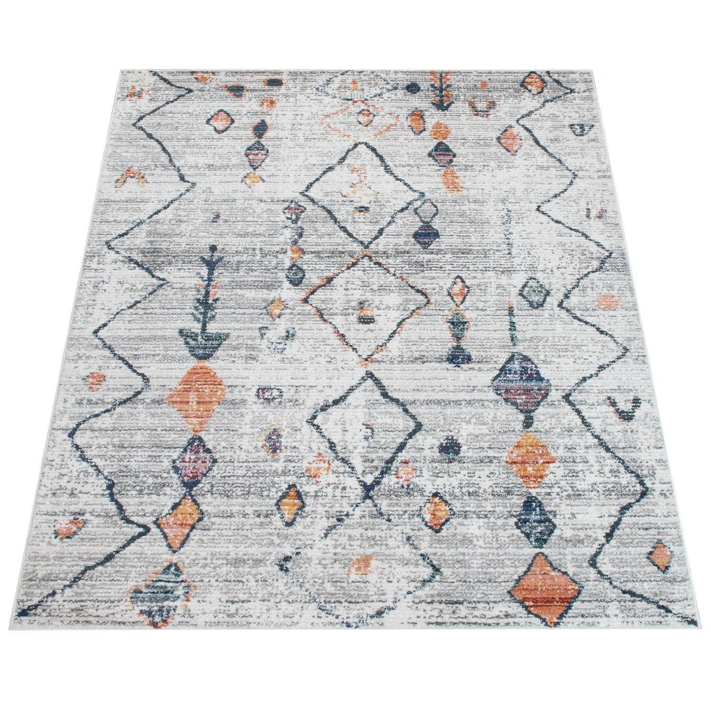 Patterned rug with geometric design on a white background