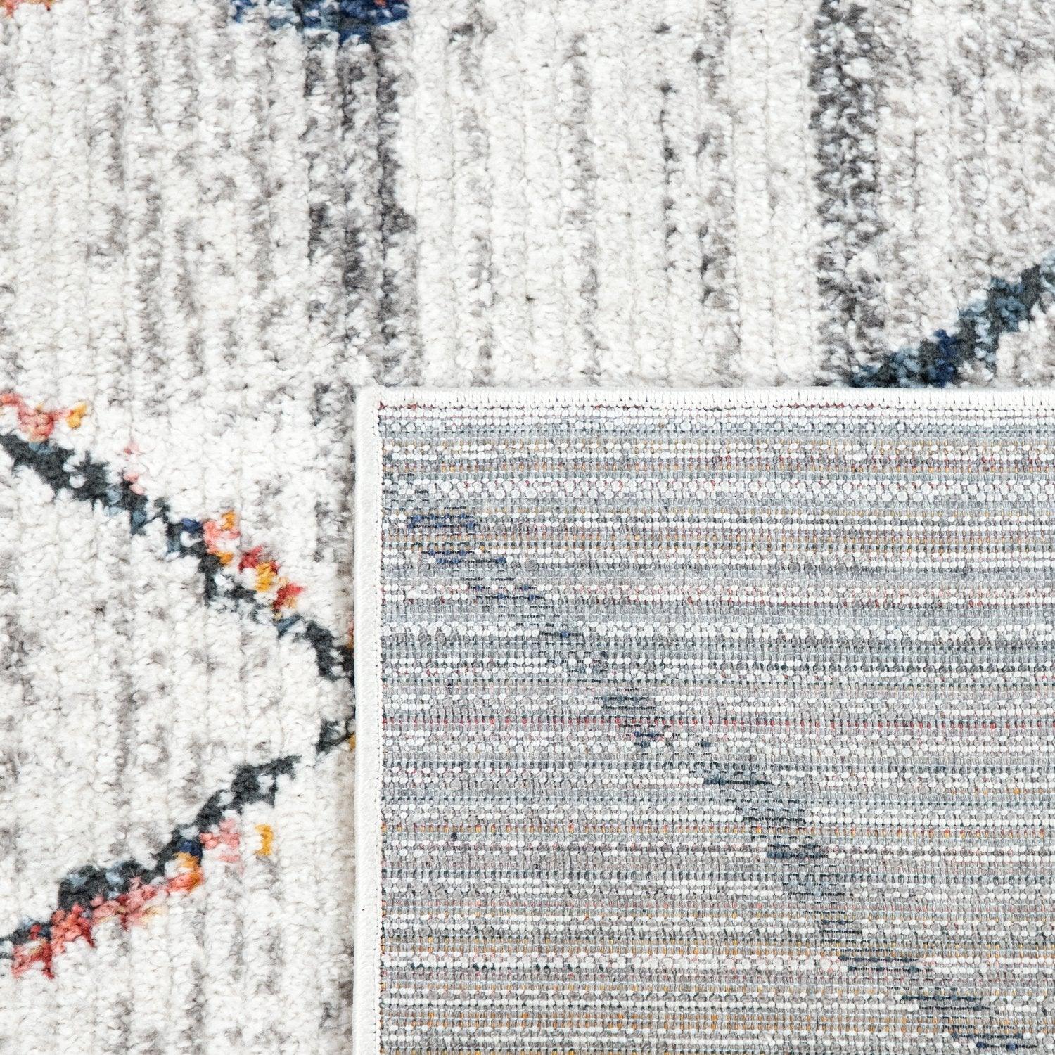 Textured rug with a mix of colors on a white background