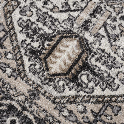 Close-up of a patterned rug with intricate designs.