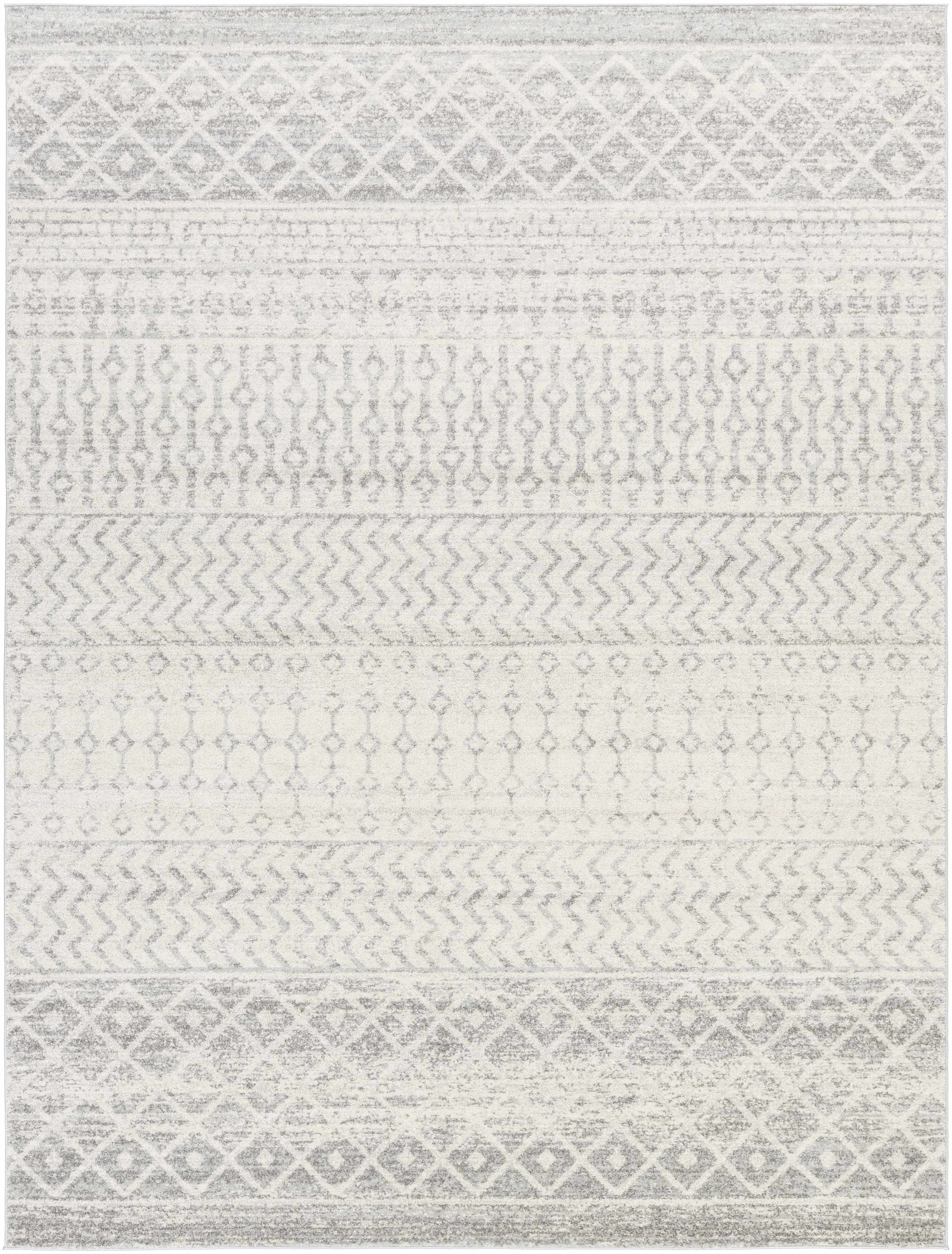 Patterned rug with geometric design in gray and white