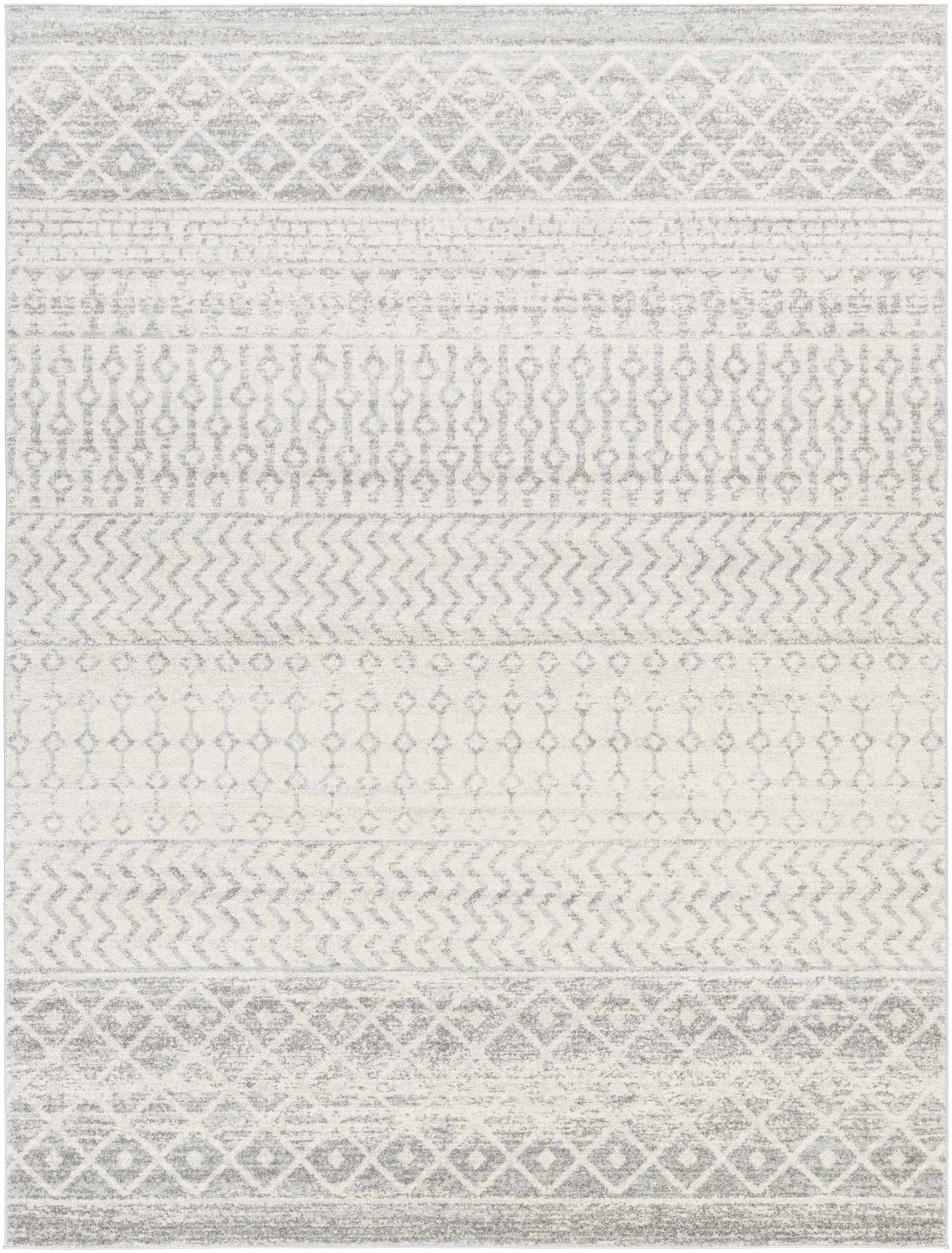 Patterned rug with geometric design in gray and white