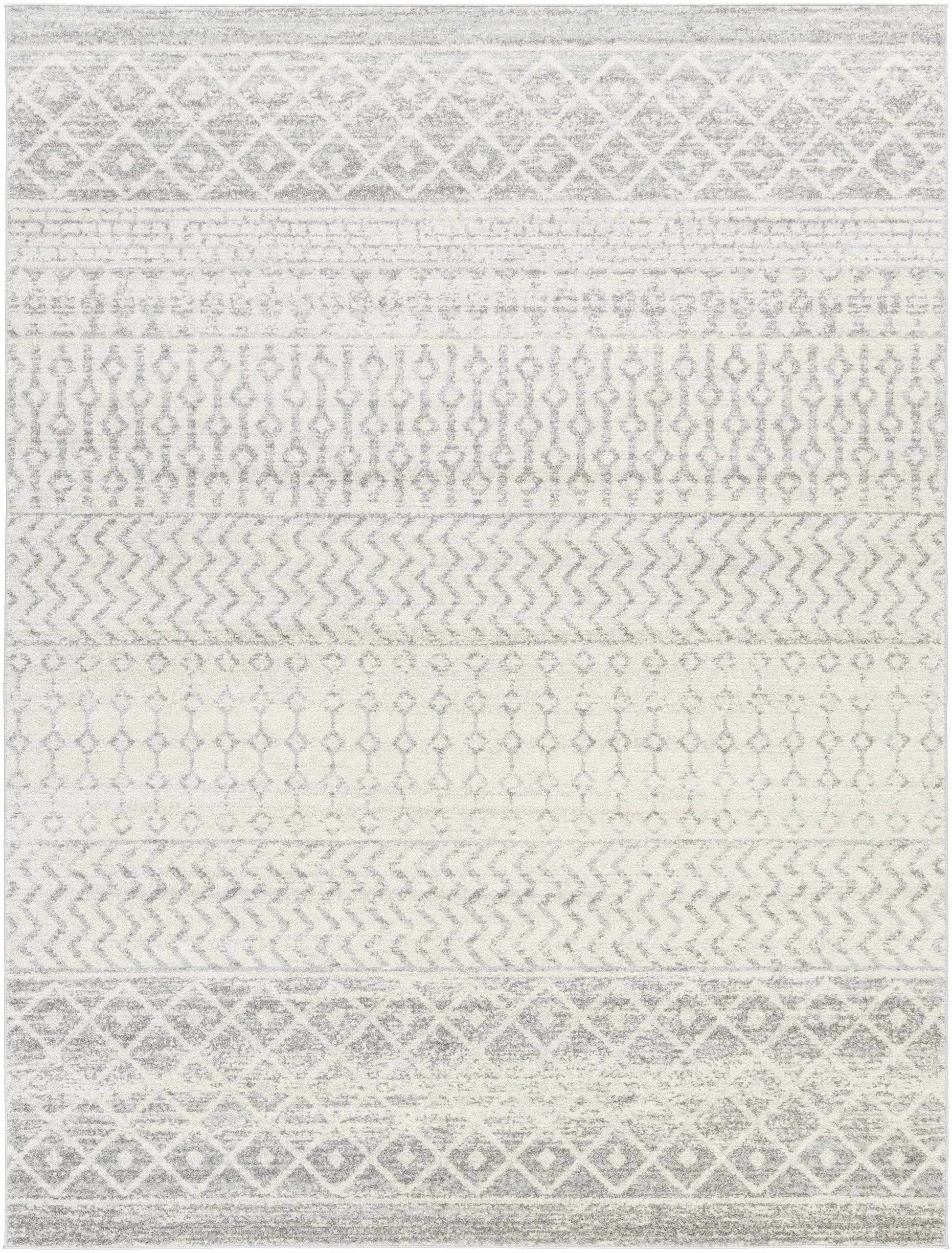 Patterned rug with geometric design in gray and white
