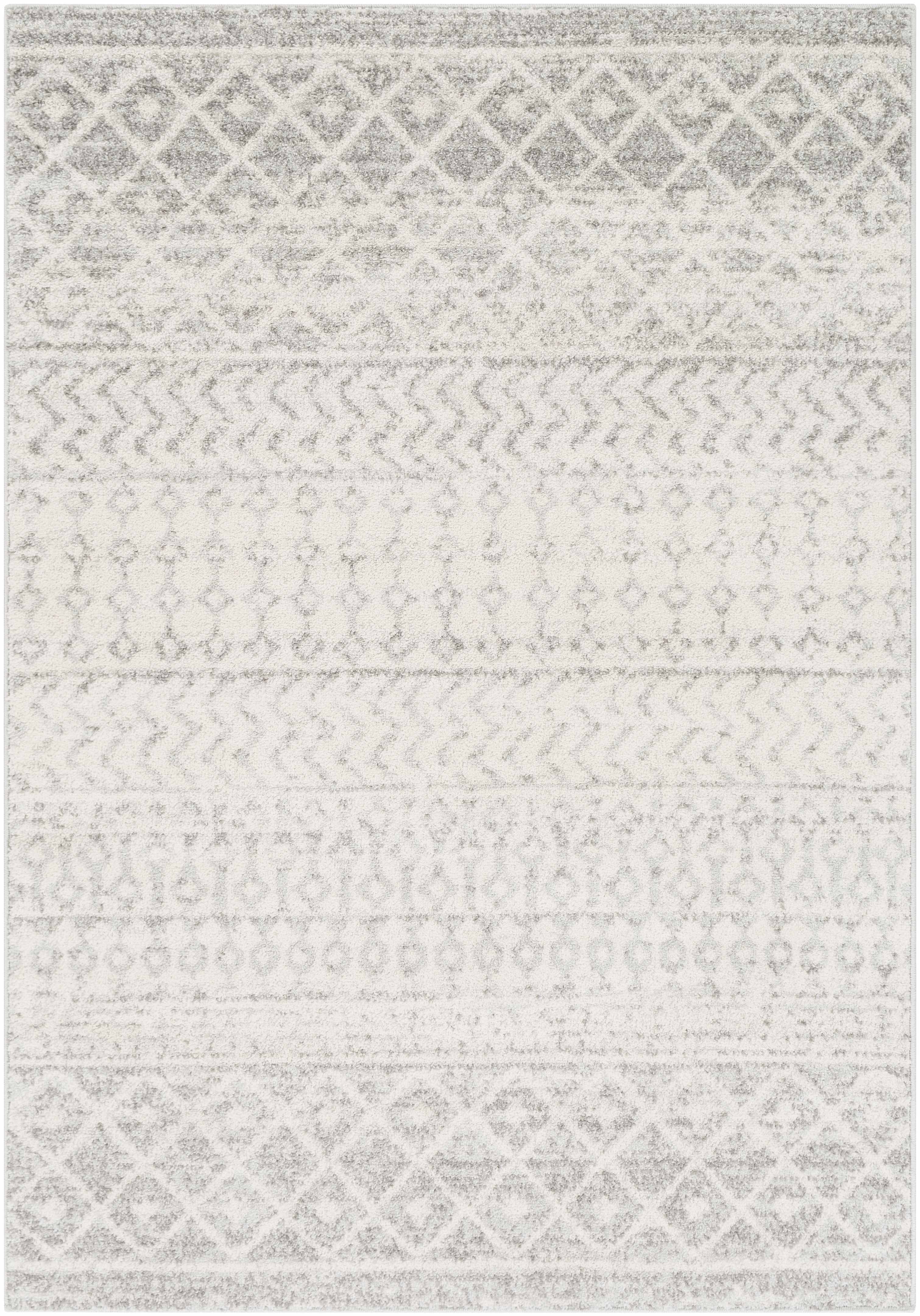 Gray and white geometric patterned rug