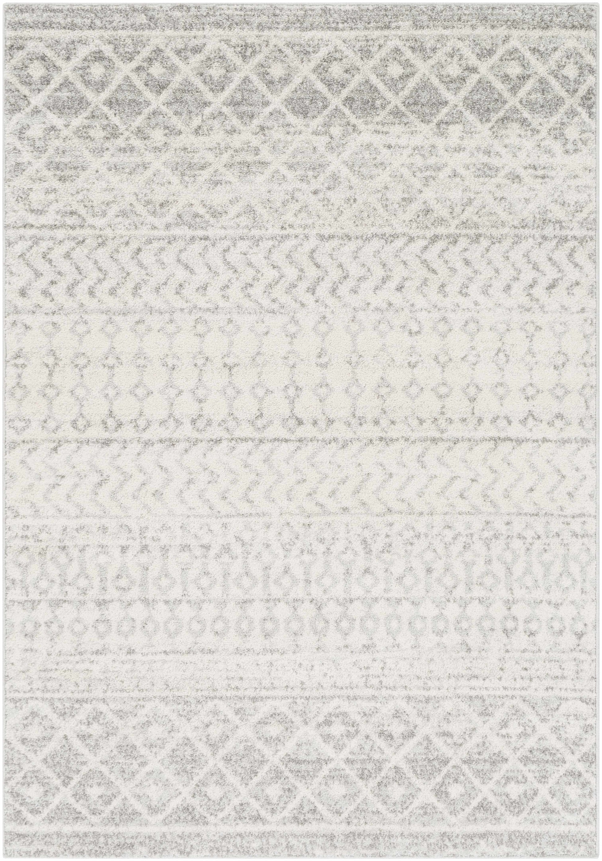 Gray and white geometric patterned rug