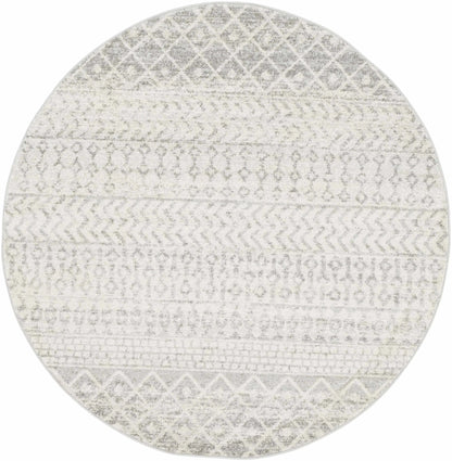 A round area rug with a distressed tribal pattern in shades of gray and off-white, shown against a plain white background.