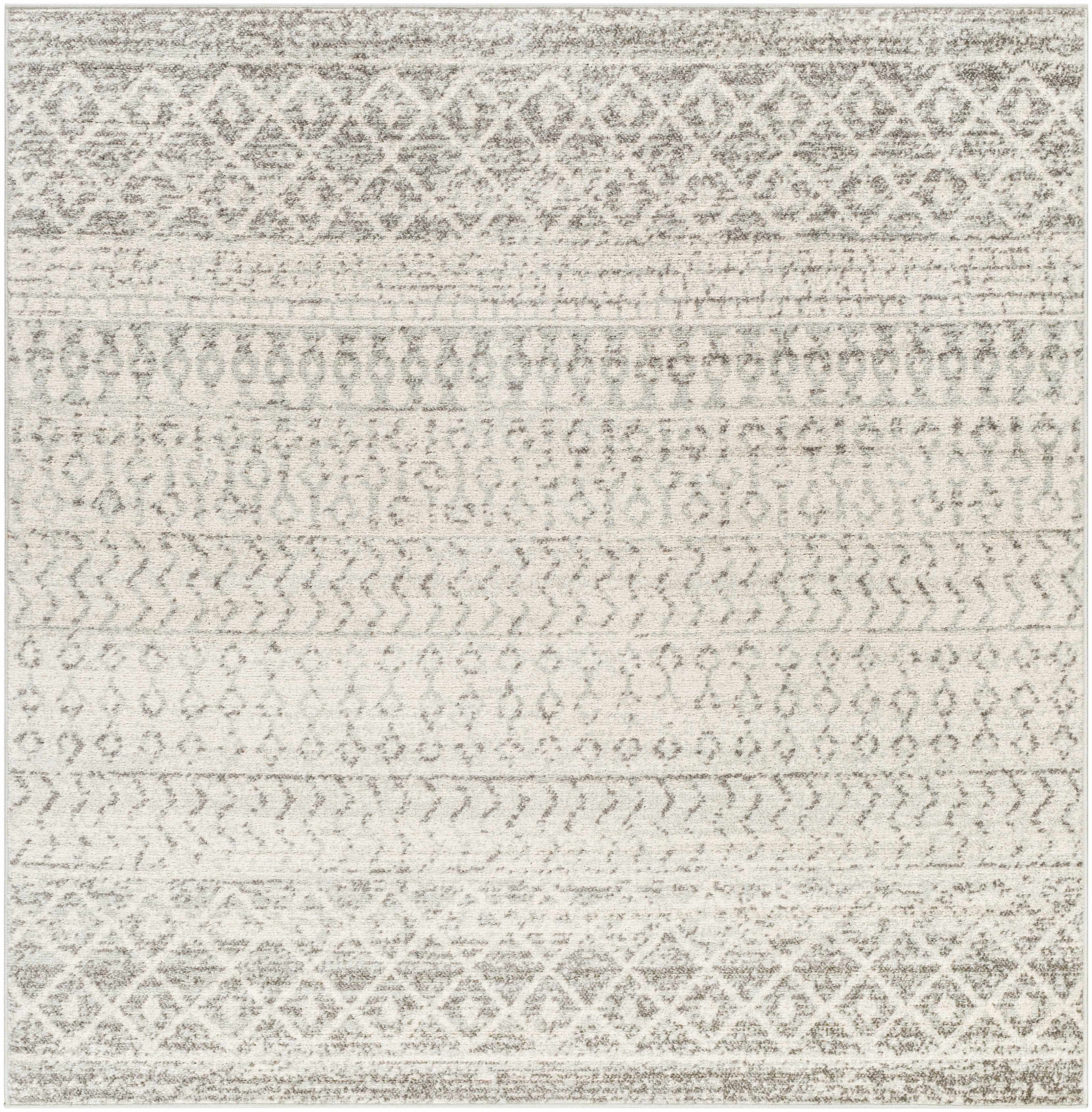 Patterned rug with geometric design in neutral colors