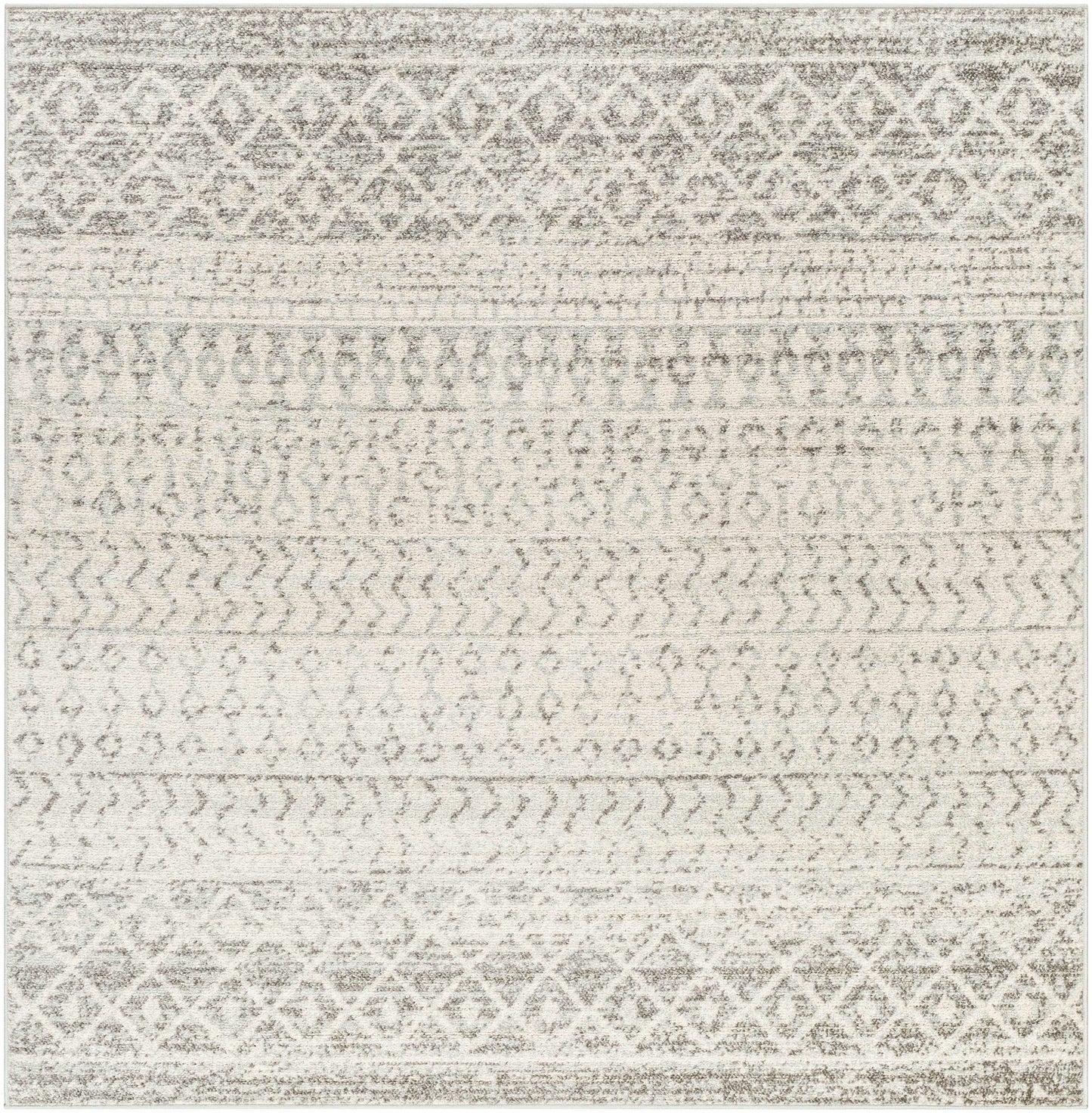 Patterned rug with geometric design in neutral colors
