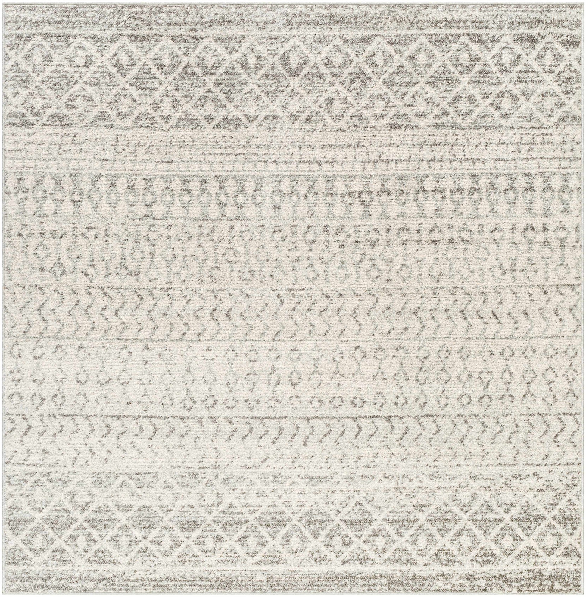 Patterned rug with geometric design in neutral colors