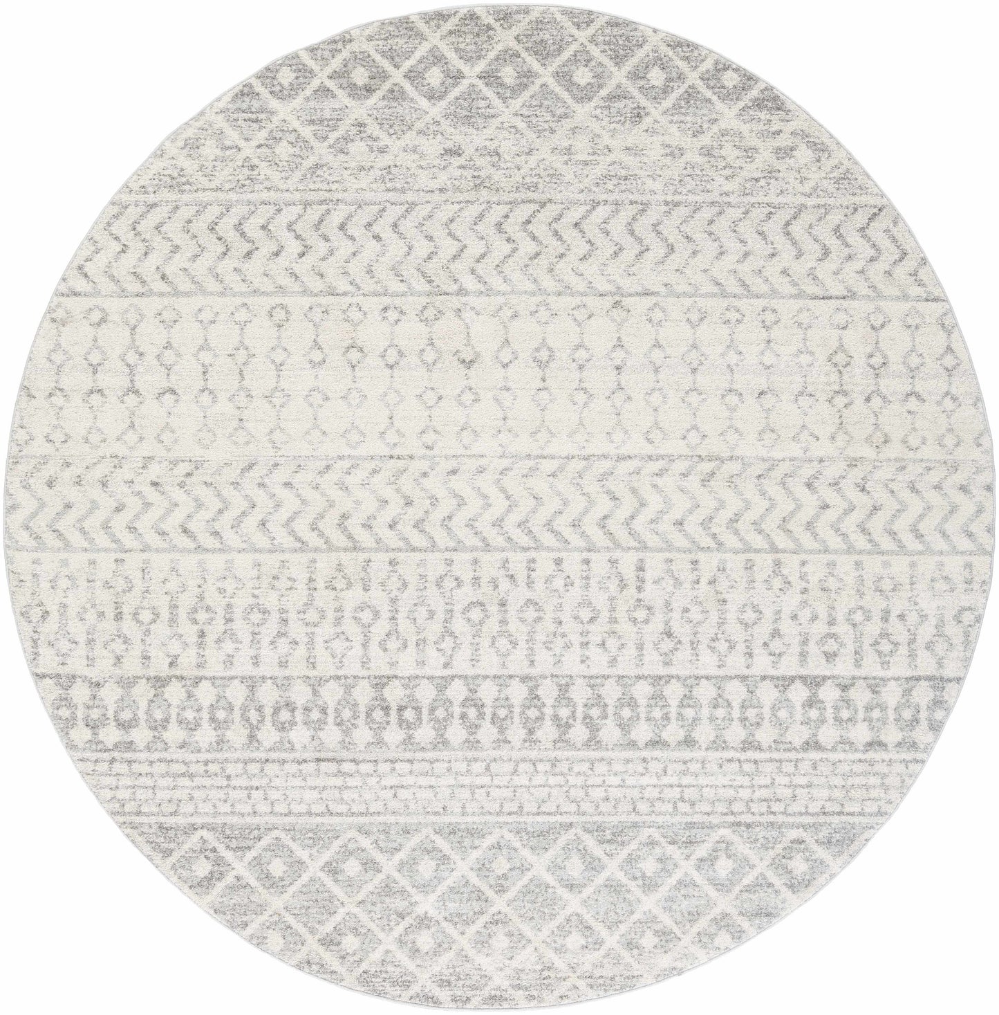 Round rug with a geometric pattern on a white background