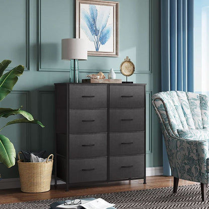 Dark wooden dresser in a room with a green wall, chair, and decorative items.