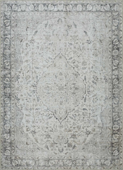 Gray area rug with decorative pattern on a plain background