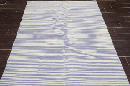 Striped rug on a wooden floor