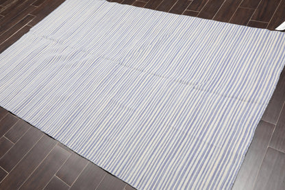 Striped rug on a wooden floor