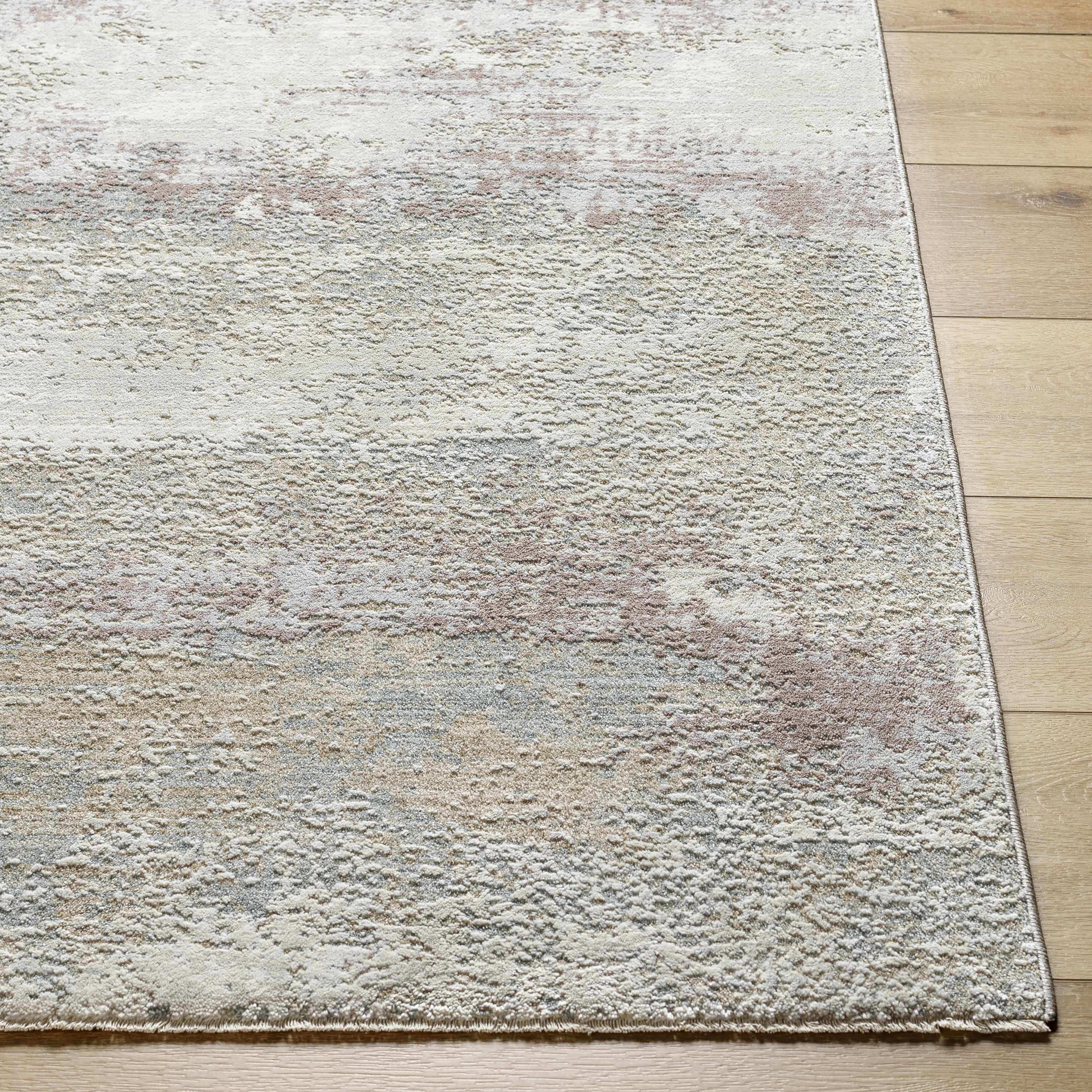 Textured area rug on a wooden floor