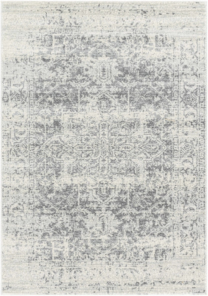 Gray and white patterned rug on a plain background