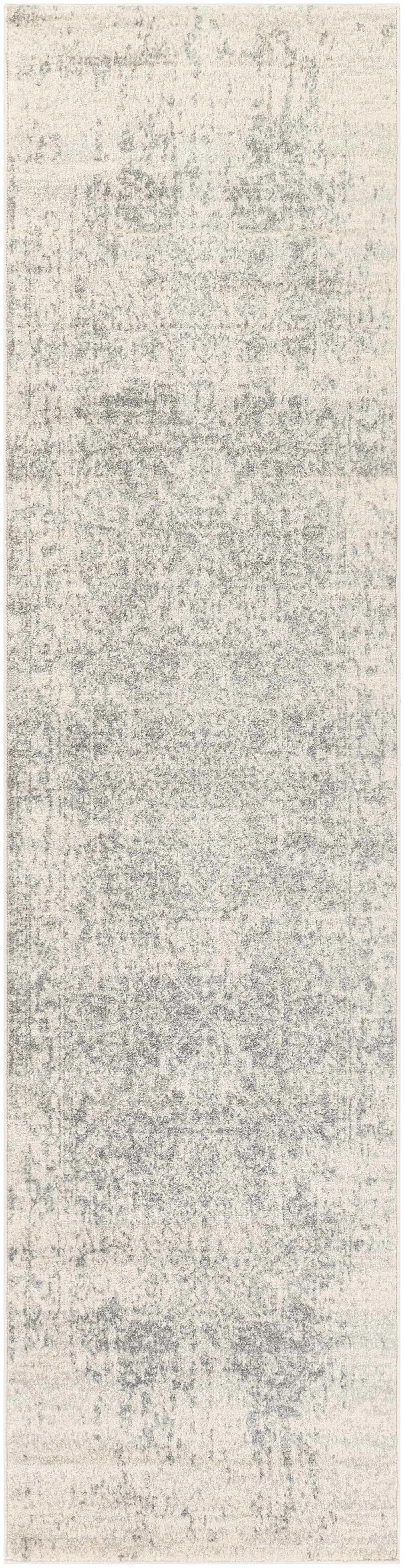 Textured gray and white runner rug on a plain background