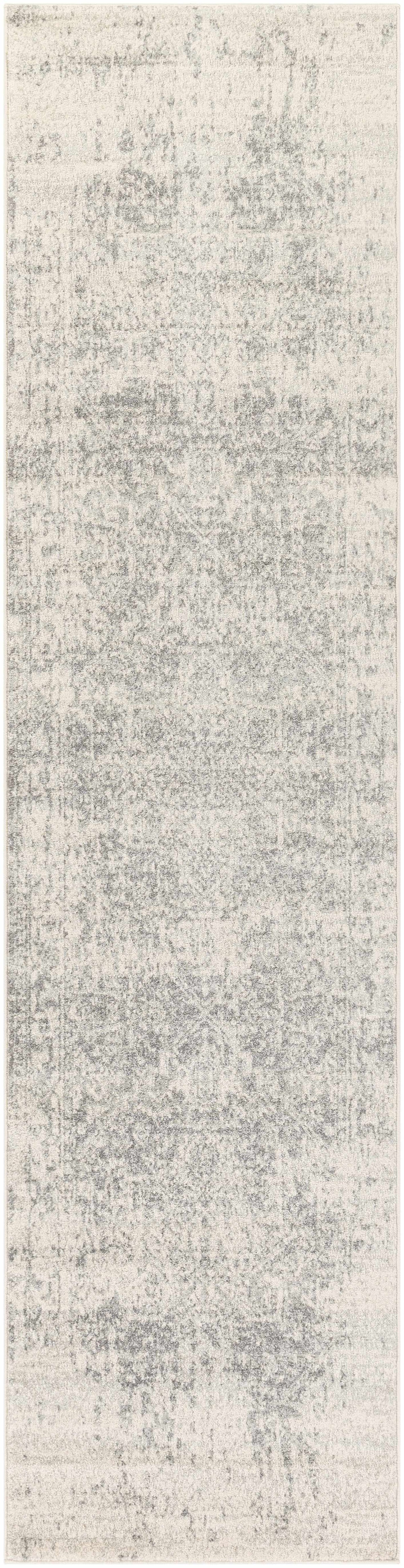 Textured gray and white runner rug on a plain background