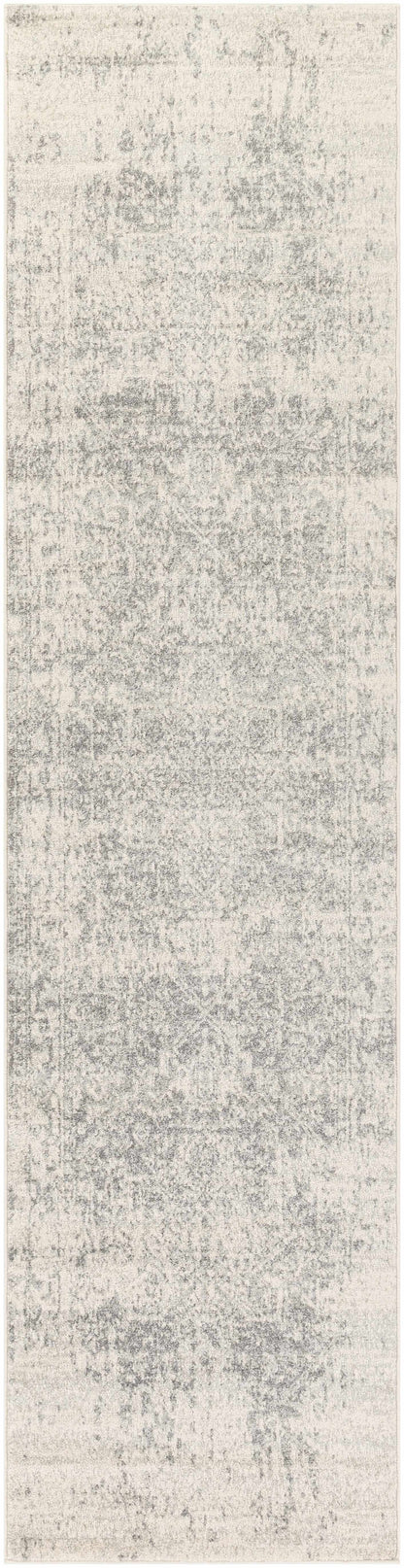 Textured gray and white runner rug on a plain background