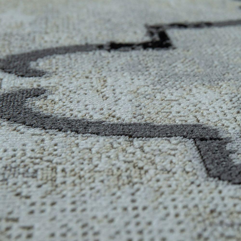 Close-up of a textured rug with a geometric pattern