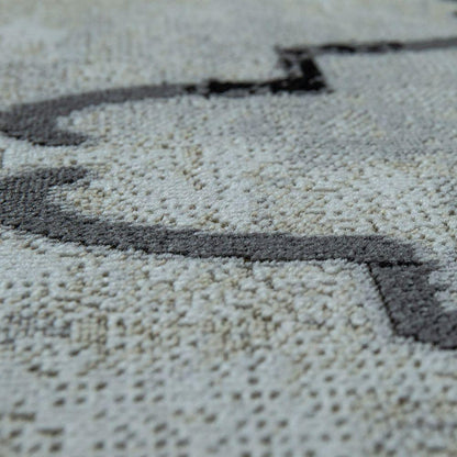 Close-up of a textured rug with a geometric pattern