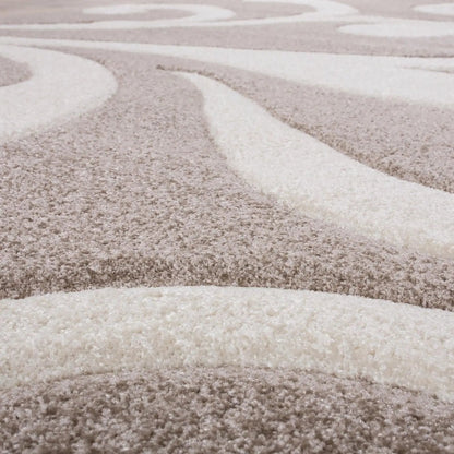 Close-up of a textured beige and brown carpet