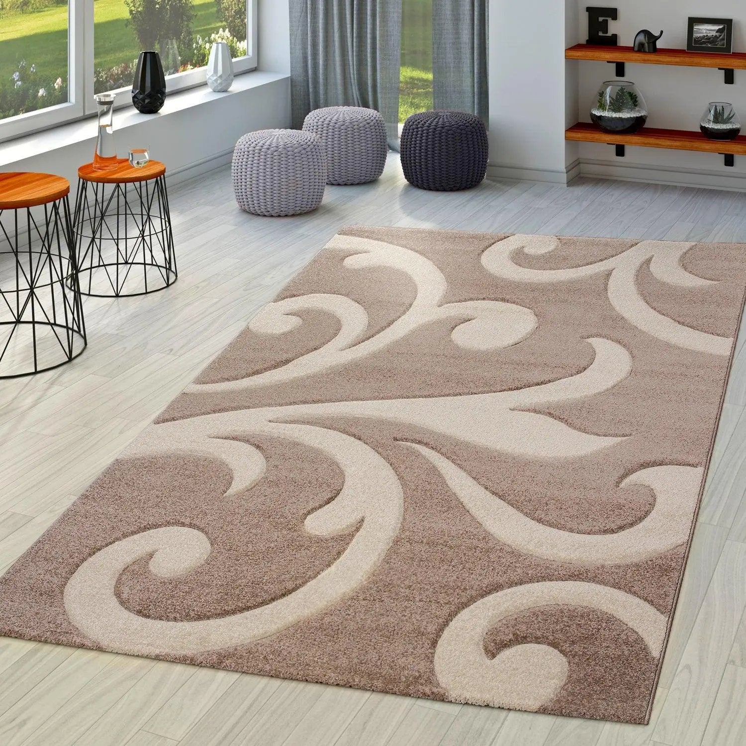 Decorative rug with intricate patterns in a room with furniture and decor.