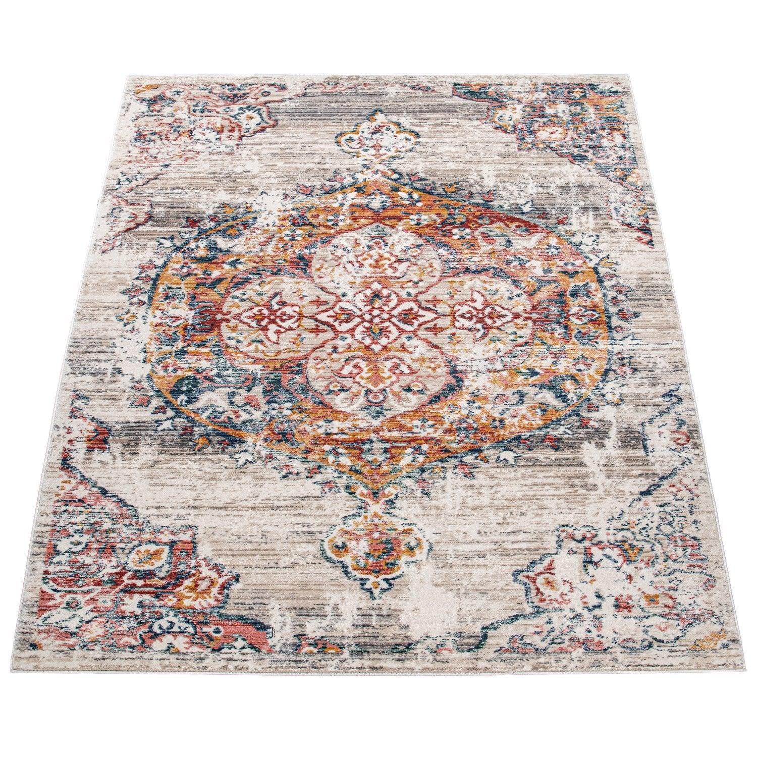 Decorative area rug with intricate pattern on a white background