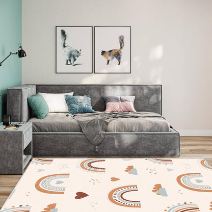 Modern bedroom with gray upholstered bed, decorative pillows, and framed animal art on the wall.