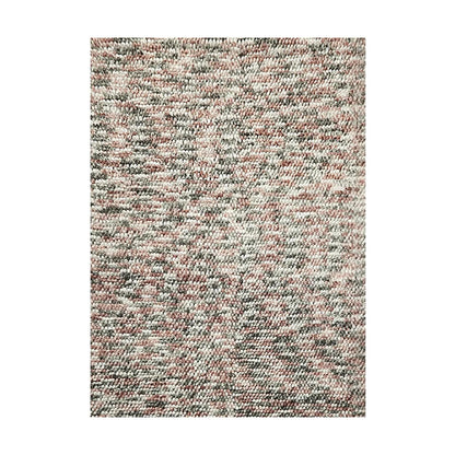 Multicolored textured area rug on a white background