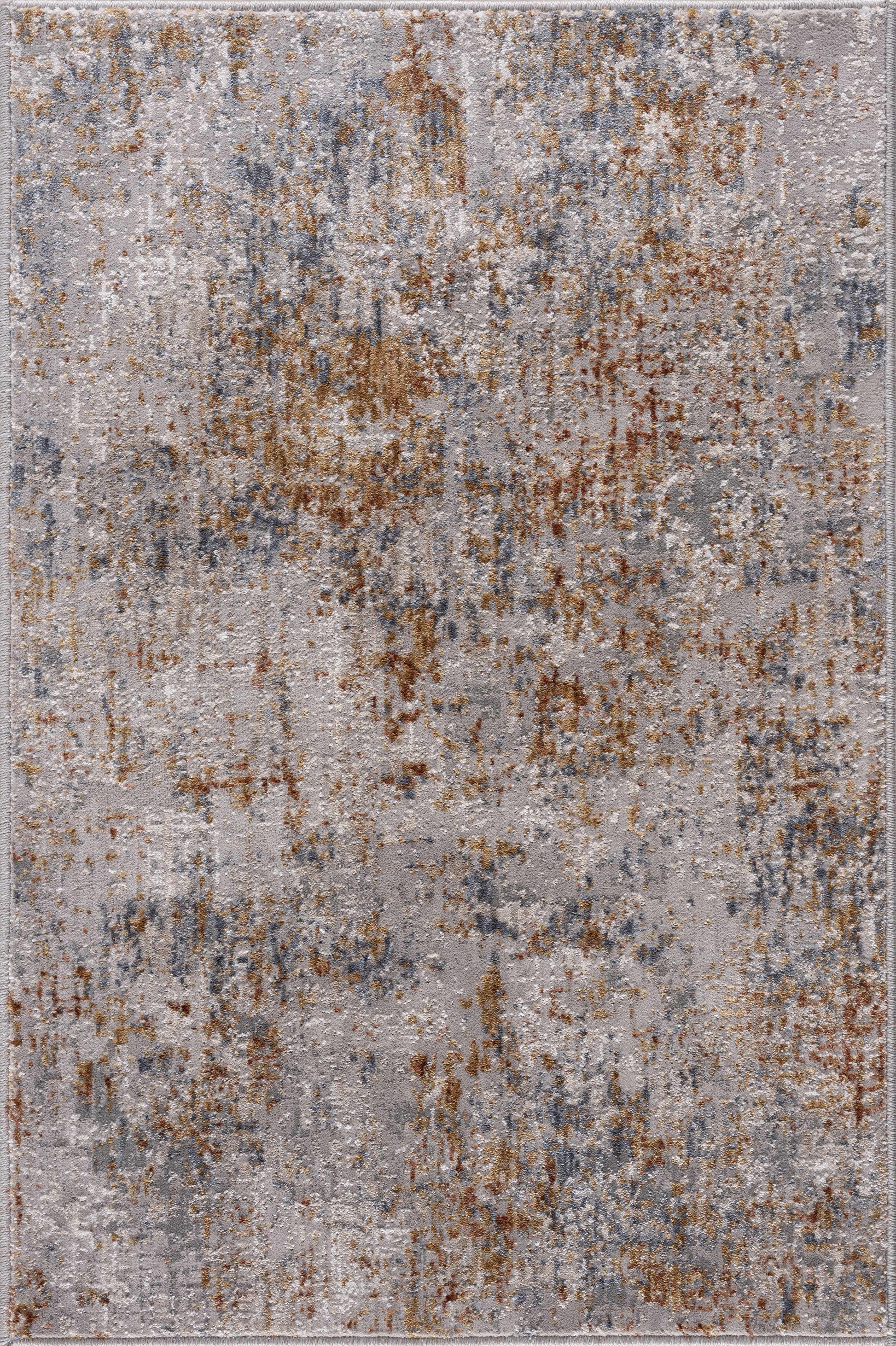Patterned rug with brown and gray colors on a plain background