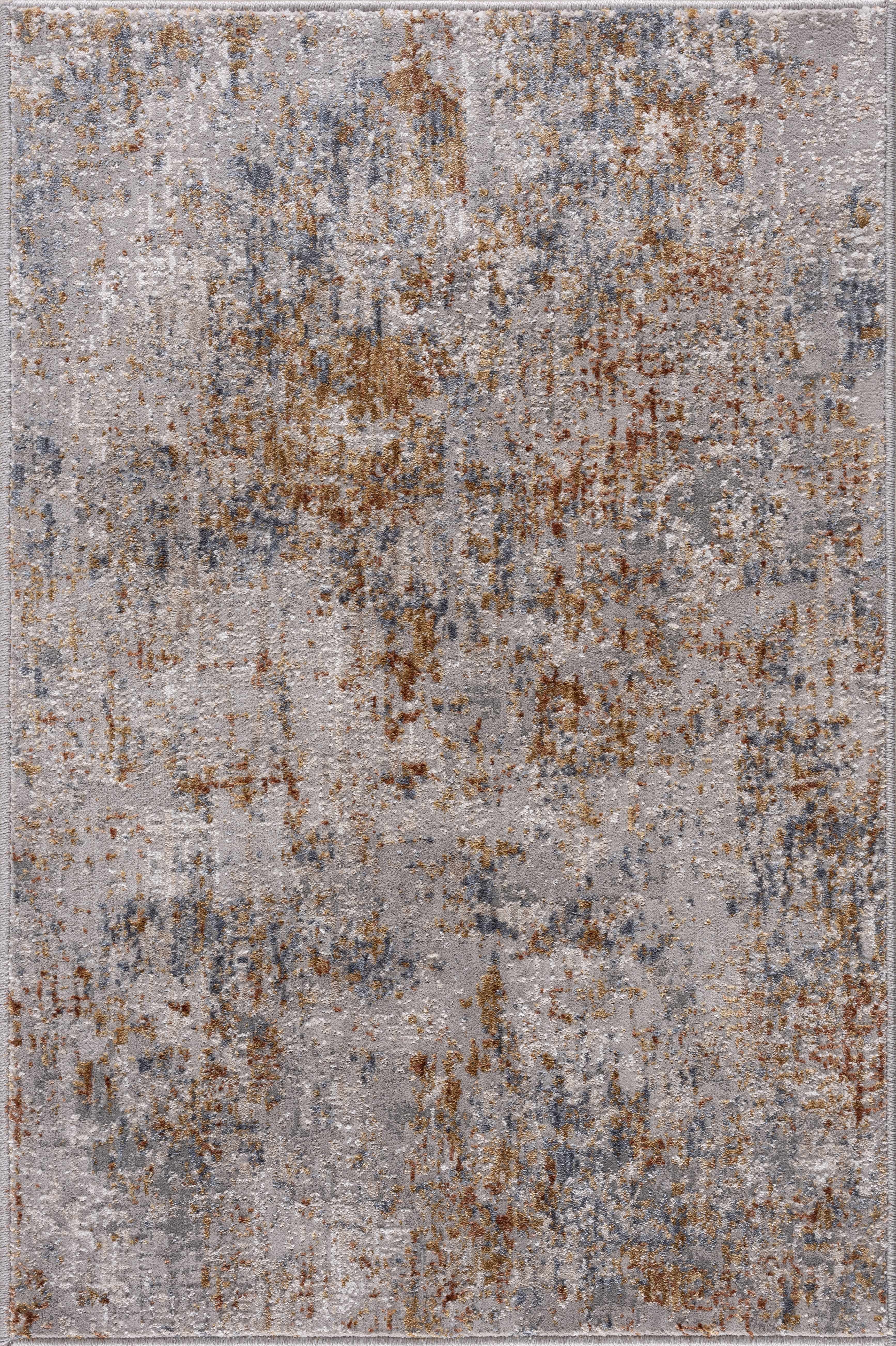 Patterned rug with brown and gray colors on a plain background