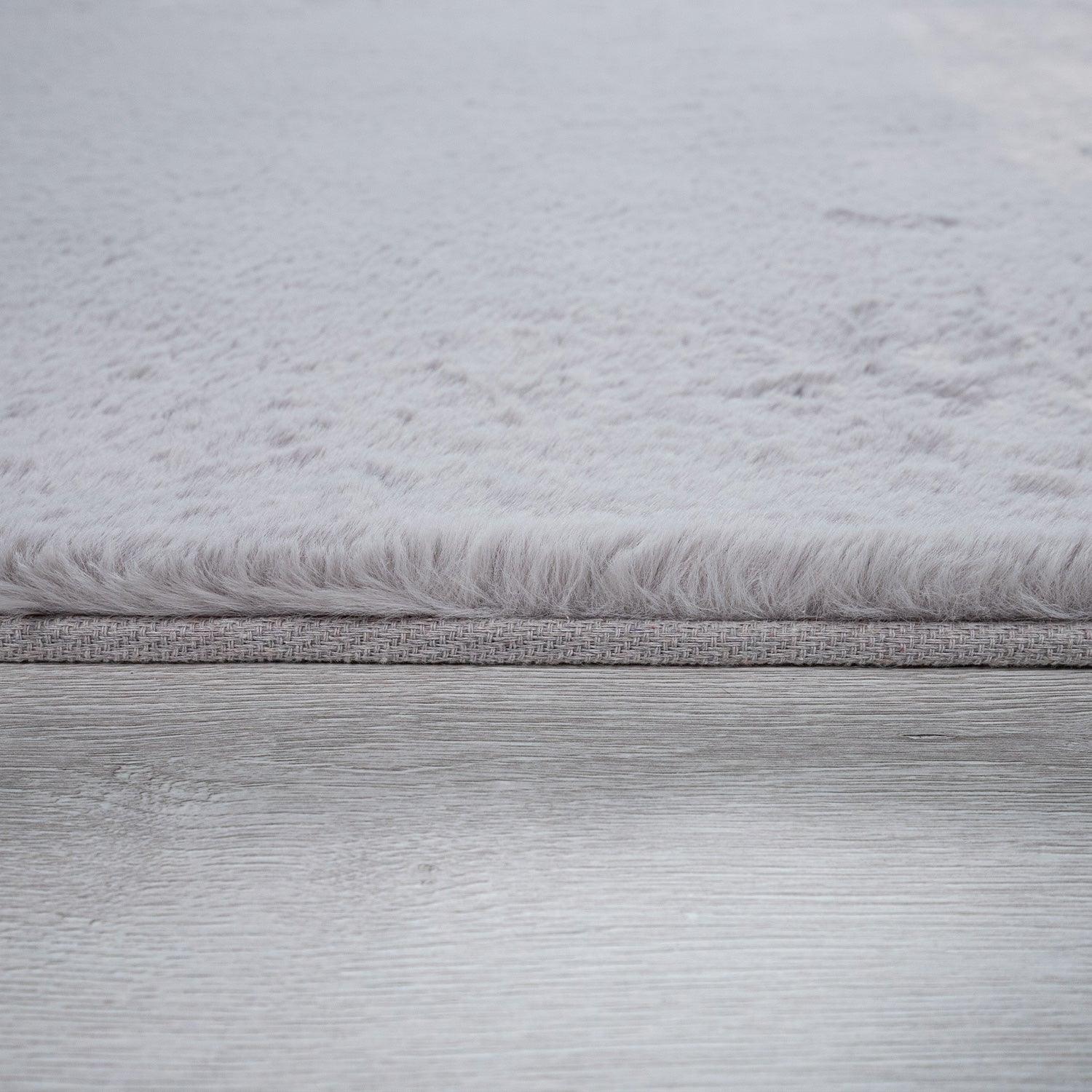 Close-up of a textured gray fabric surface
