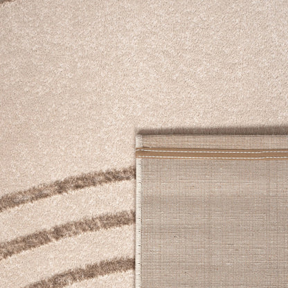 Close-up of a textured fabric with horizontal stripes in beige and brown.