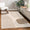 Modern rug with abstract design in a living room setting
