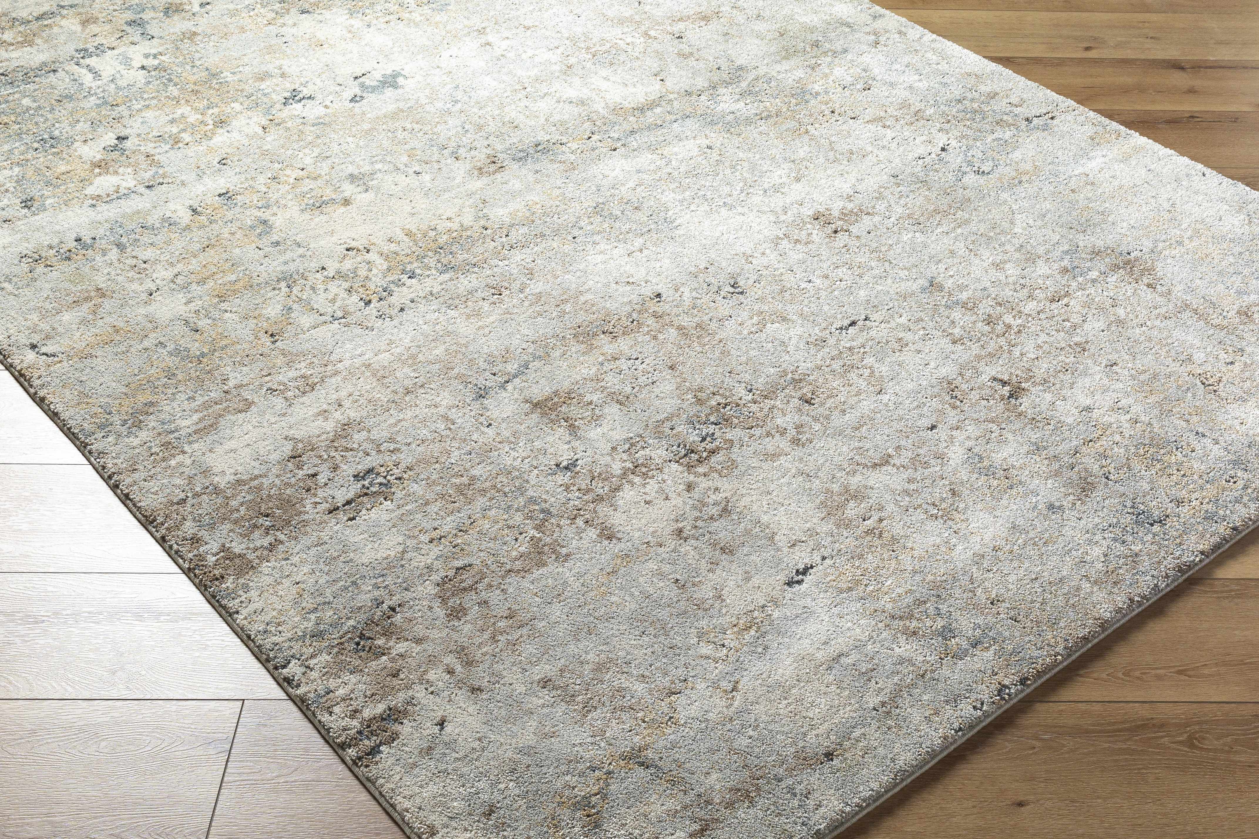 Textured area rug on a wooden floor