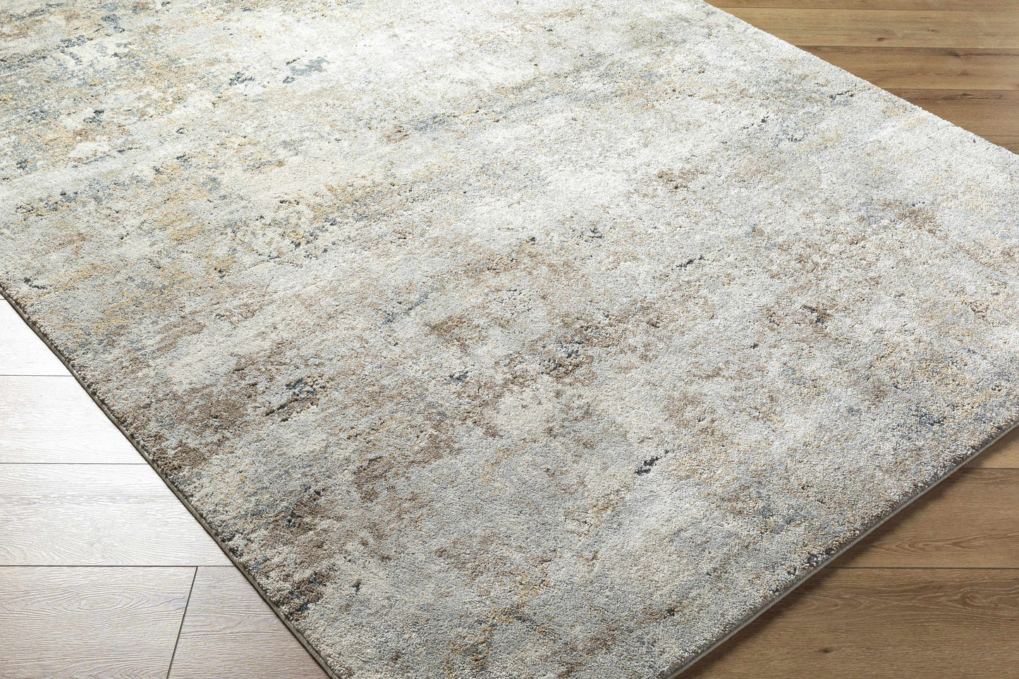 Textured area rug on a wooden floor