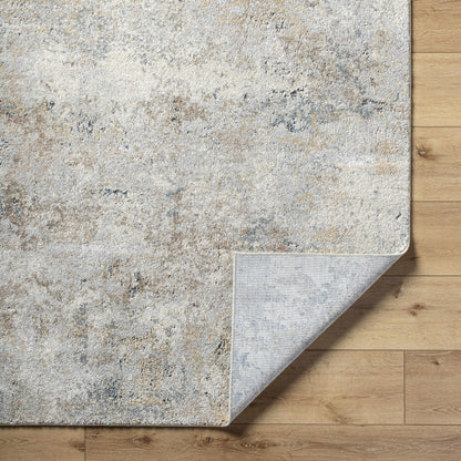 Textured area rug on a wooden floor
