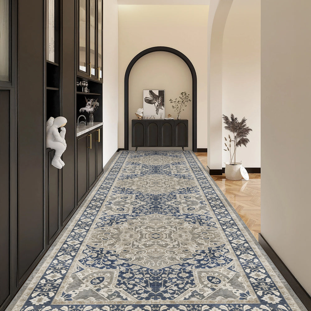 Decorative rug with blue and gray pattern in a modern hallway
