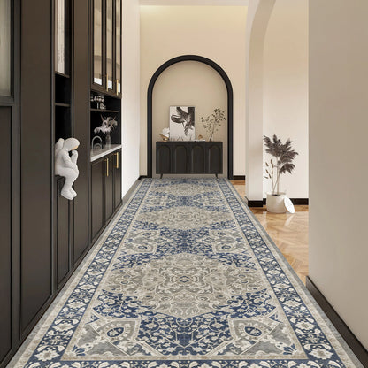 Decorative rug with blue and gray pattern in a modern hallway