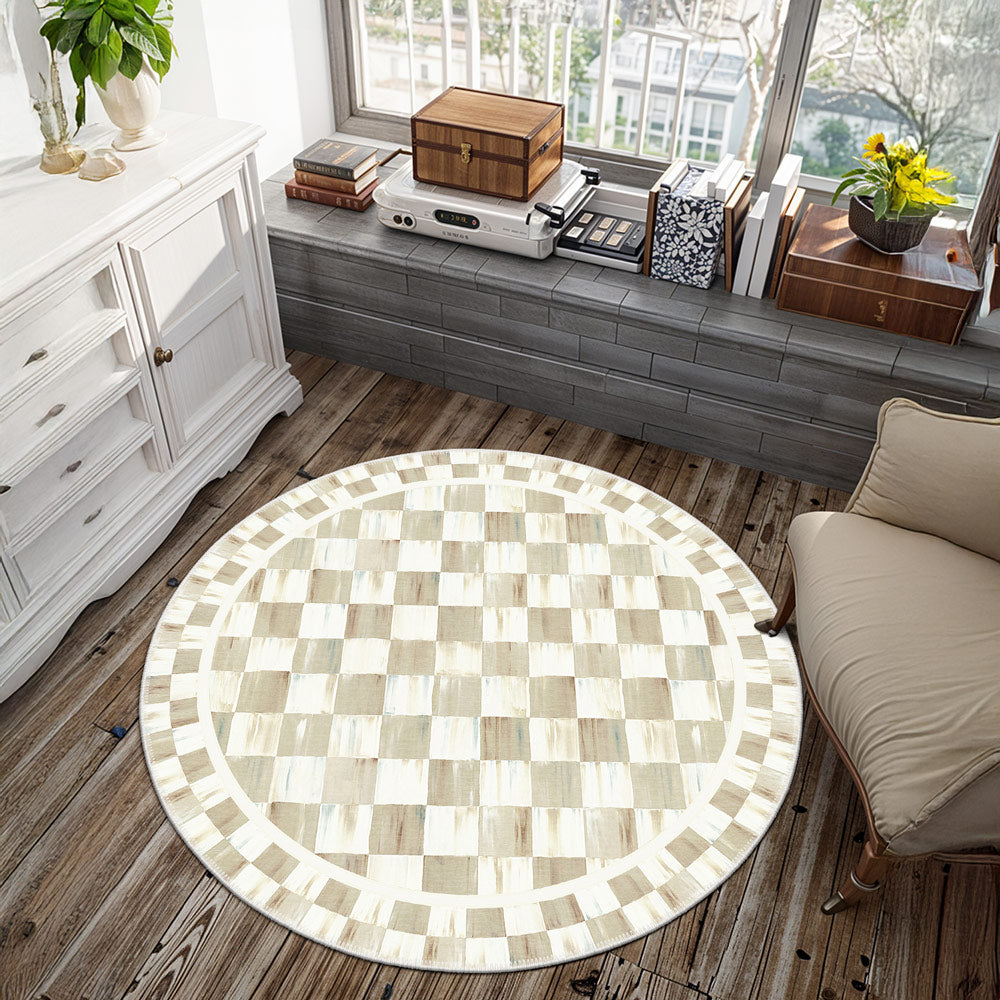 Round checkered rug on a wooden floor with a window and furniture in the background
