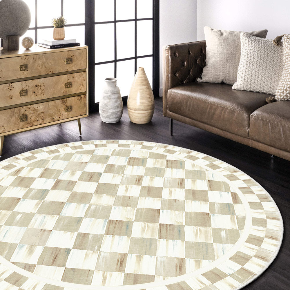 Round checkered rug in a living room with a brown leather sofa and wooden side table.