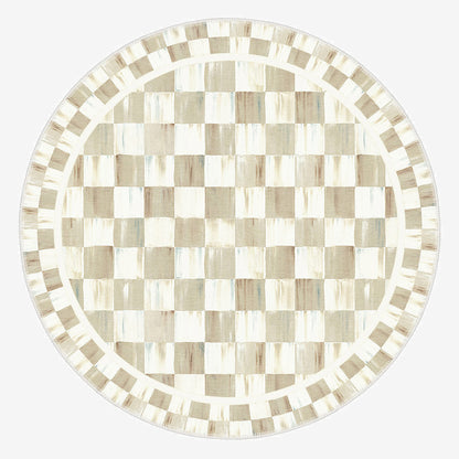 Round checkered table top with a beige and white pattern on a white background
